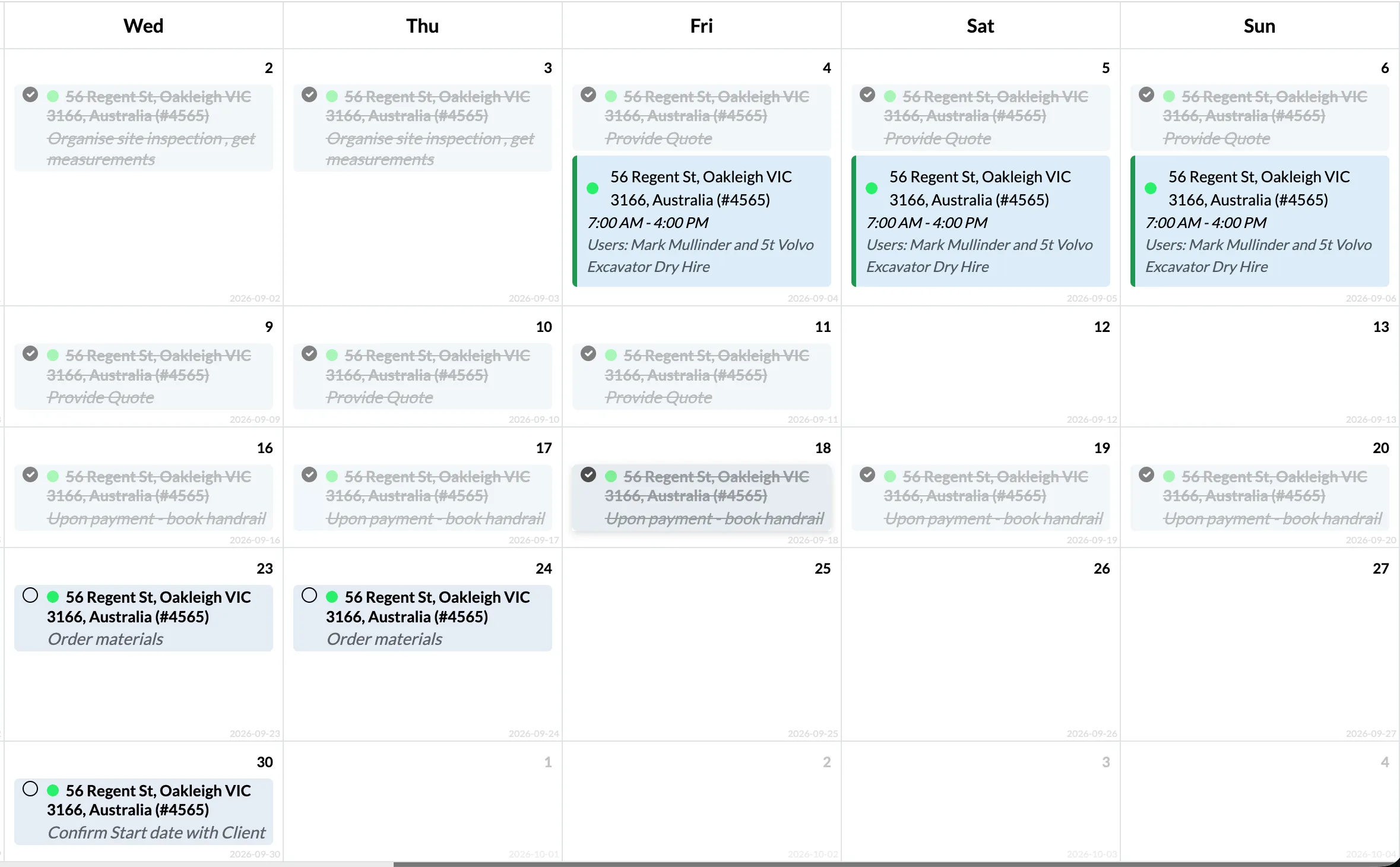 The Trak scheduling calendar in month view, showing jobs and tasks booked across a team